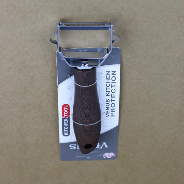 Steel peeler with wooden handle - waseeh.com