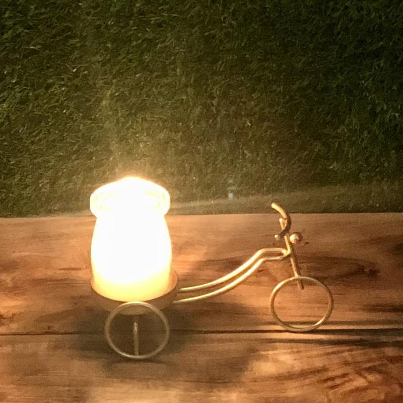 Cycle Metal Golden Candle Stand with Glass Pot & Candle - waseeh.com